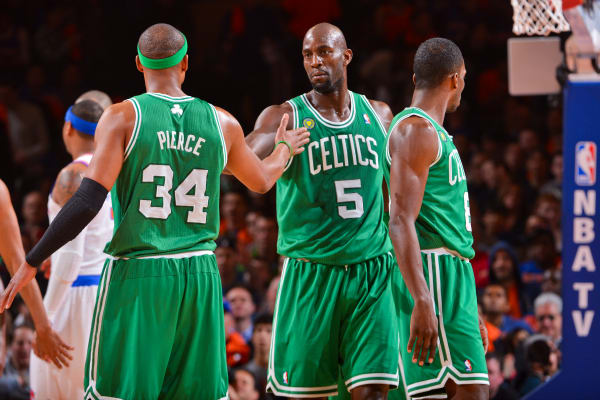 Paul Pierce and Kevin Garnett in Round 1 of the NBA playoffs against the Knicks. The Celtics are reportedly discussing trading the two future Hall of Famers to the Nets. (Jesse D. Garrabrant/Getty Images)